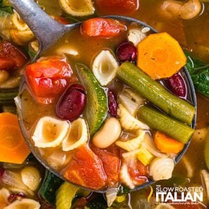 minestrone soup in ladle