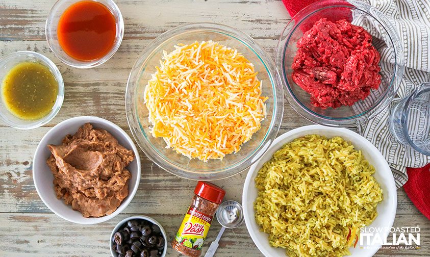 overhead: bowls of ingredients for taco dip recipe