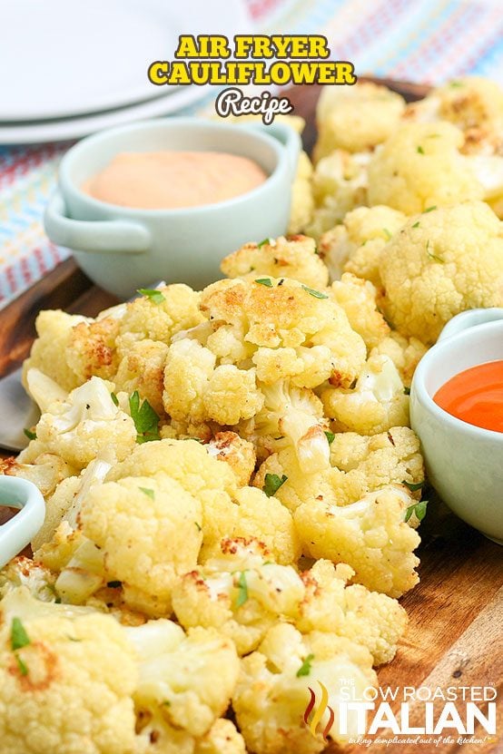 air fryer cauliflower on a serving board with dipping sauces
