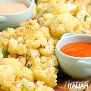 fried cauliflower next to red sauce