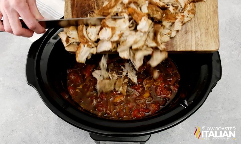 adding chopped meat to crock pot chicken fajitas
