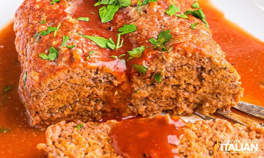 crockpot meatloaf with sauce on platter
