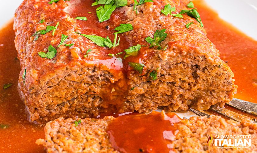 crockpot meatloaf with sauce on platter