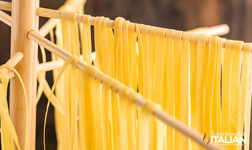 homemade pasta on a drying rack