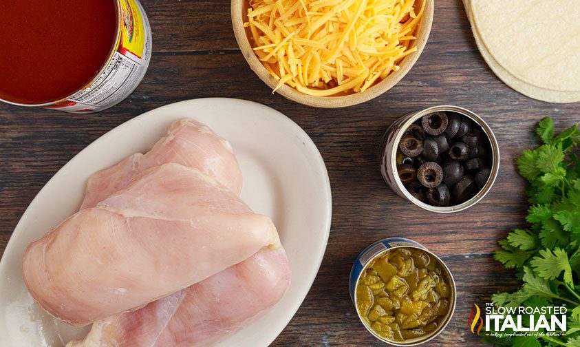 overhead: bowls of ingredients for slow cooker enchilada casserole