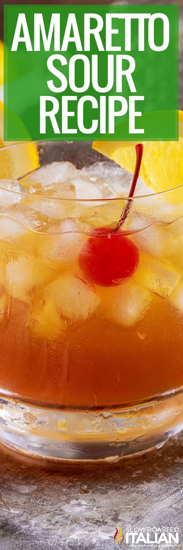 amaretto sour with cherry in glass close up