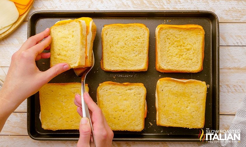 flipping grilled cheese sandwiches in oven