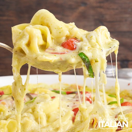 forkful of cheesy baked tortellini
