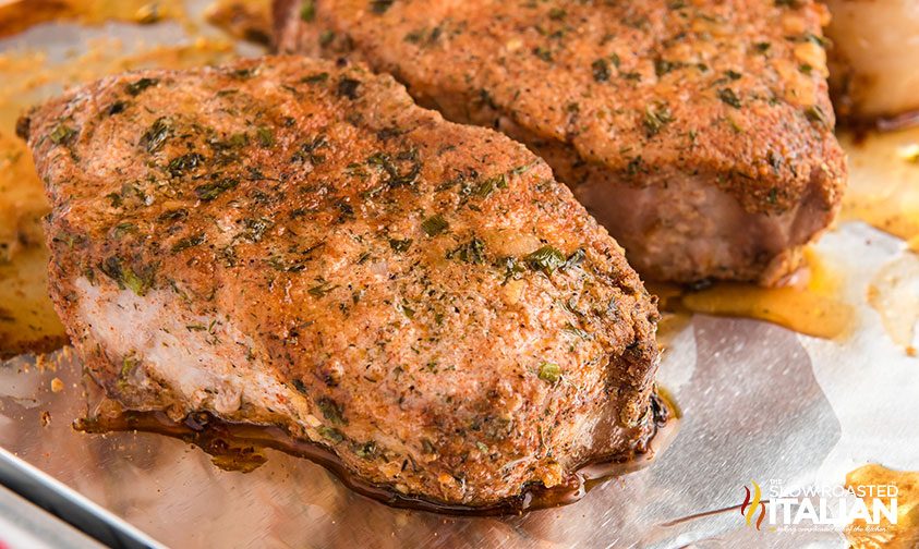 ranch pork chops on a baking sheet