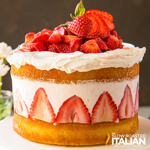 cake decorated with fresh strawberries