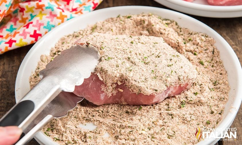 coating piece of meat in ranch seasoning mix