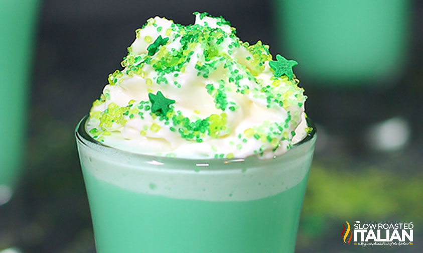 close up of whipped cream on top of shamrock shot