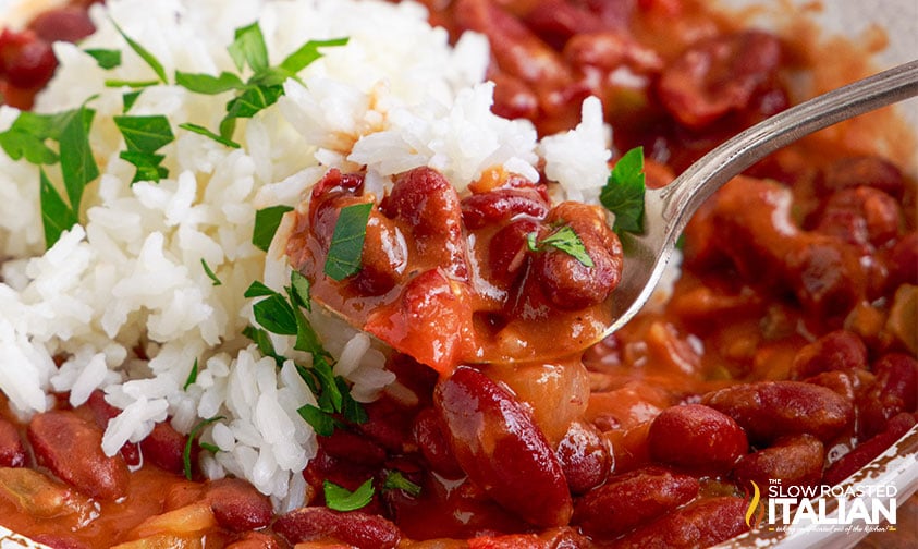 Popeyes red beans and rice on spoon, close up