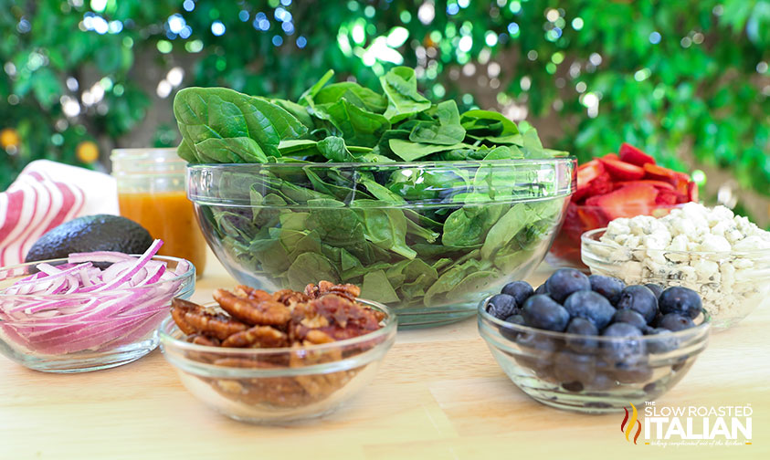 salad ingredients in small bowls