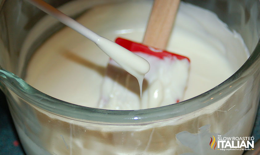 melted white chocolate on lollipop stick