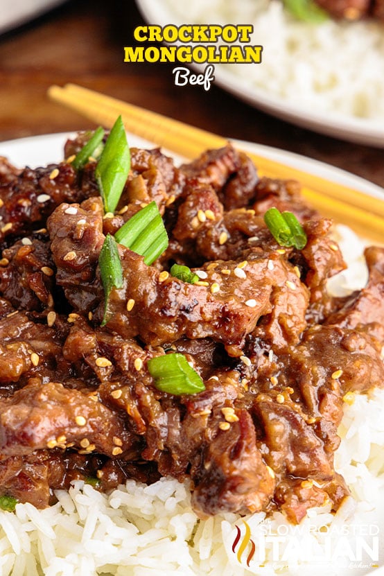 A plate of food with rice meat and vegetables, with Beef