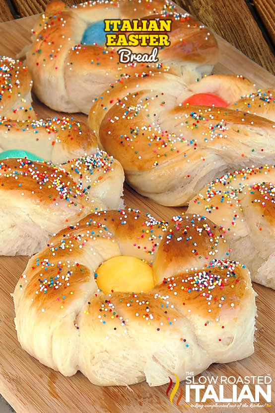 italian easter bread topped with colored eggs and sprinkles