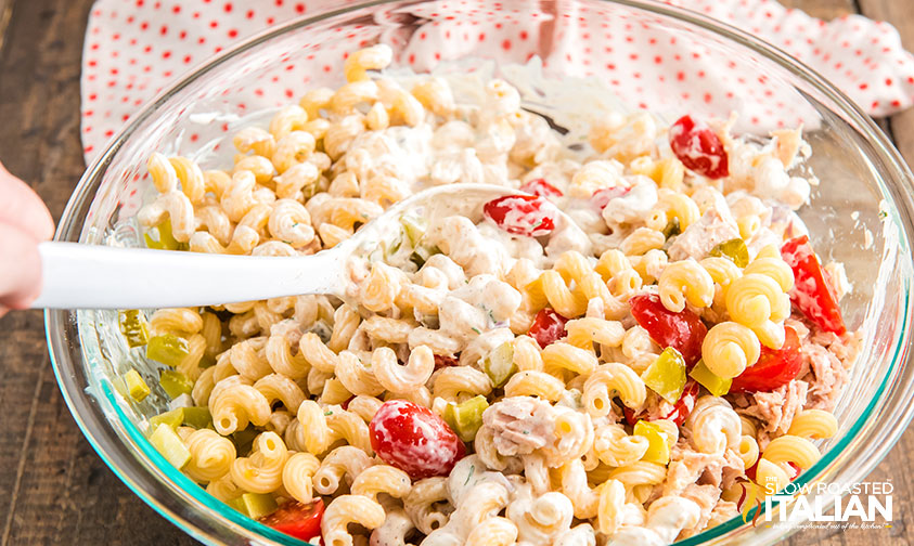 tuna salad with noodles dressing poured over top