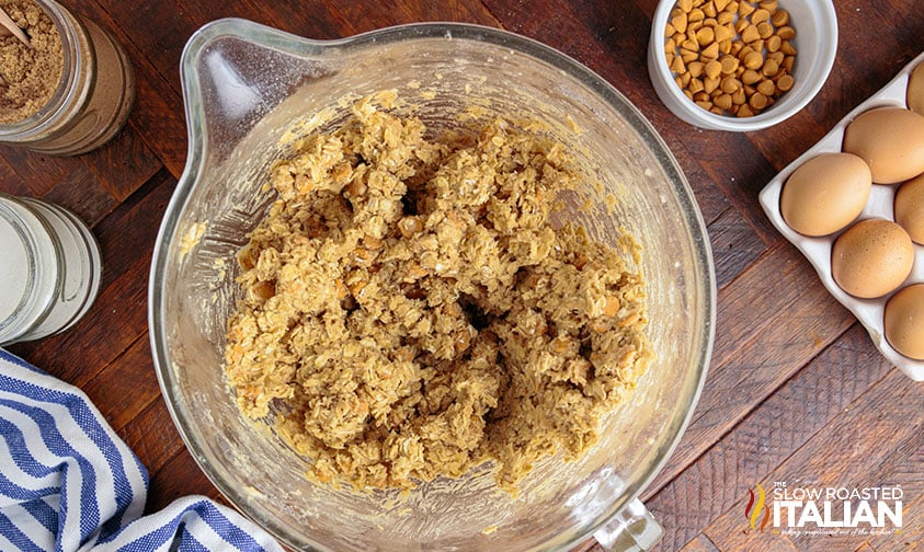 overhead: raw cookie dough in glass mixing bowl