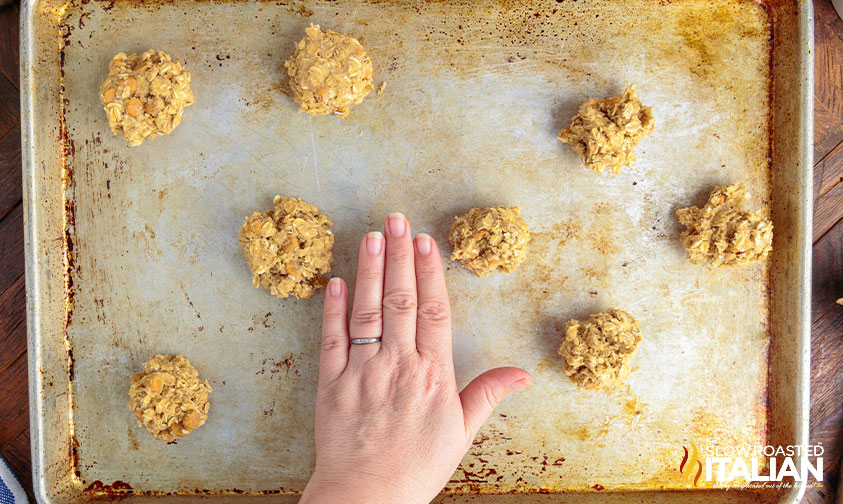 balls of unbaked cookie dough on baking sheet