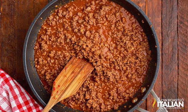 overhead: ground beef simmering in skillet