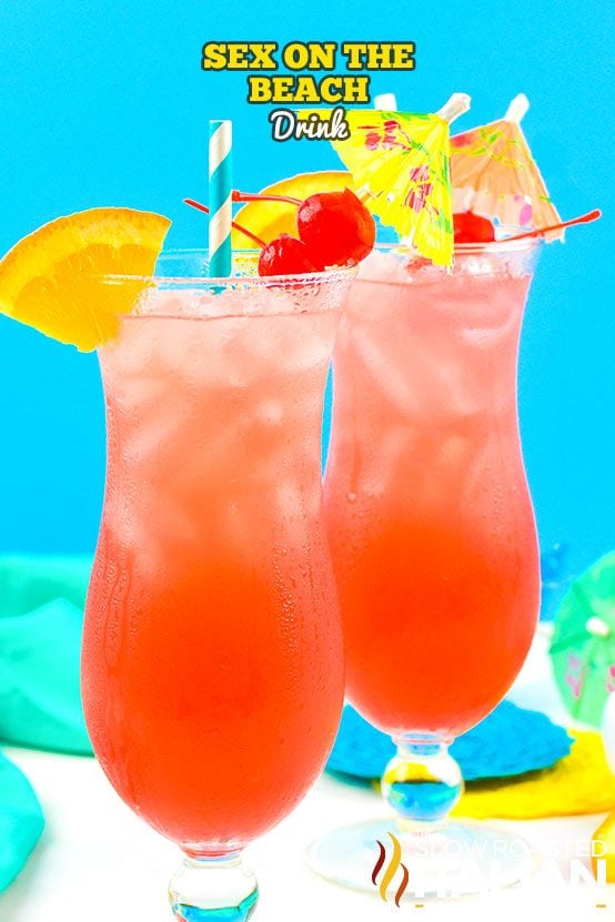 two tropical cocktails in hurricane glasses