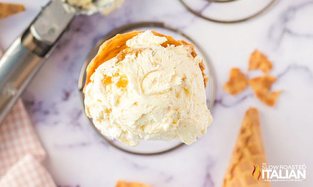 overhead: scoop of cheesecake ice cream in ice cream cone