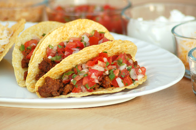 homemade tacos on white plate