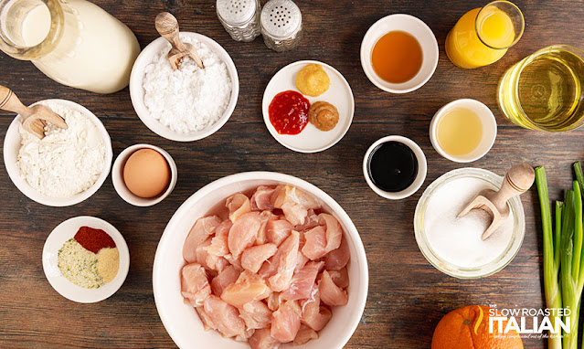 orange chicken recipe ingredients in prep bowls