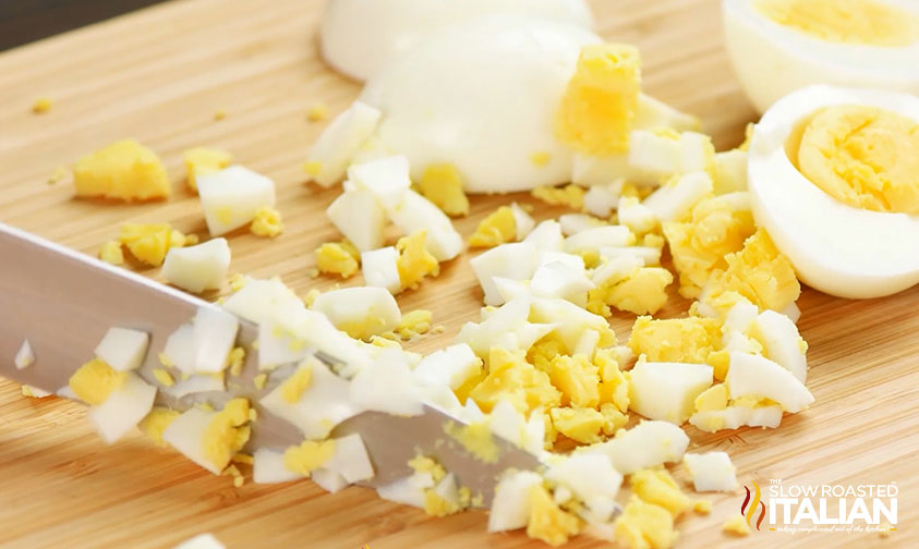 knife chopping hard boiled egg