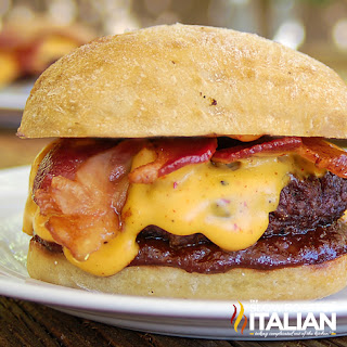 closeup: bbq smokehouse burger with cheese and bacon