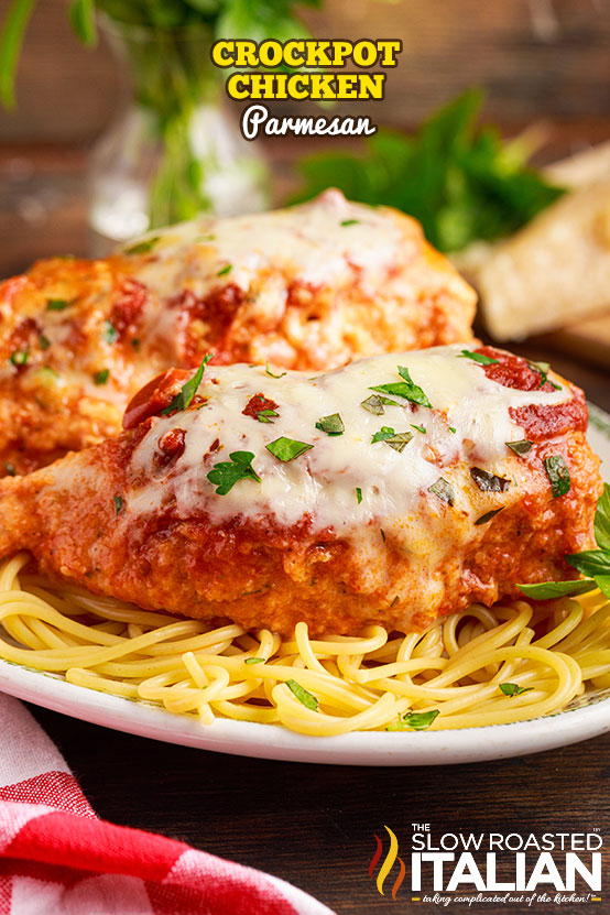 titled: crockpot chicken parmesan (shown on spaghetti)