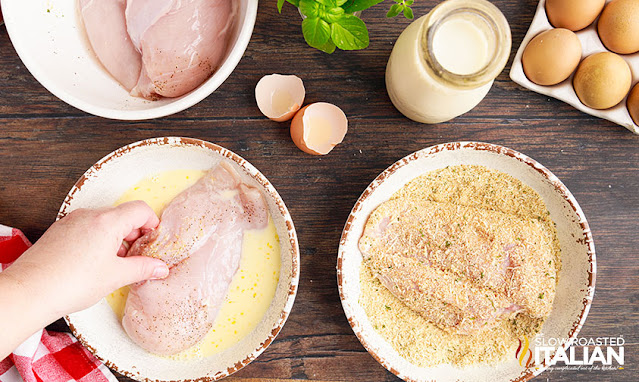 breading station - chicken in egg wash, chicken in breading
