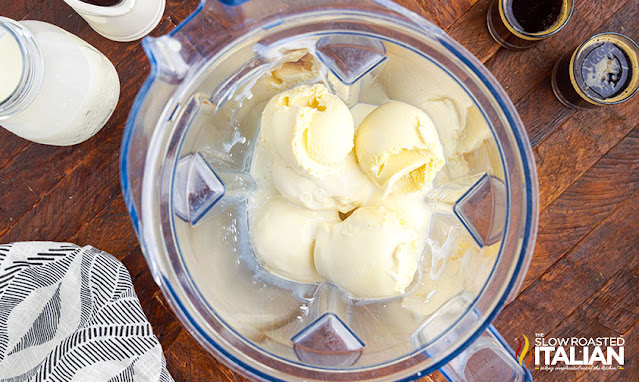 vanilla ice cream and milk in blender for milkshake recipe
