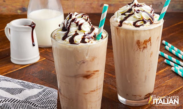 arby's jamocha shakes on a table next to chocolate syrup and milk