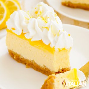 slice of baked lemon cheesecake on white plate