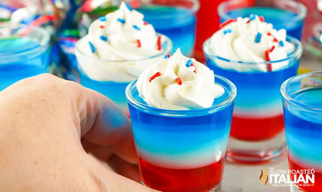 4th of july jello shots with whipped cream and sprinkles on top