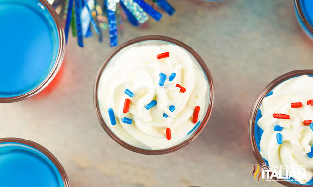 overhead: whipped cream and sprinkles on July 4th cocktails