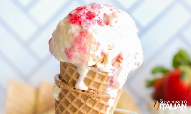 scoop of strawberry shortcake ice cream in cone