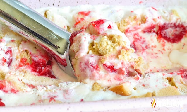 scooping strawberry shortcake ice cream