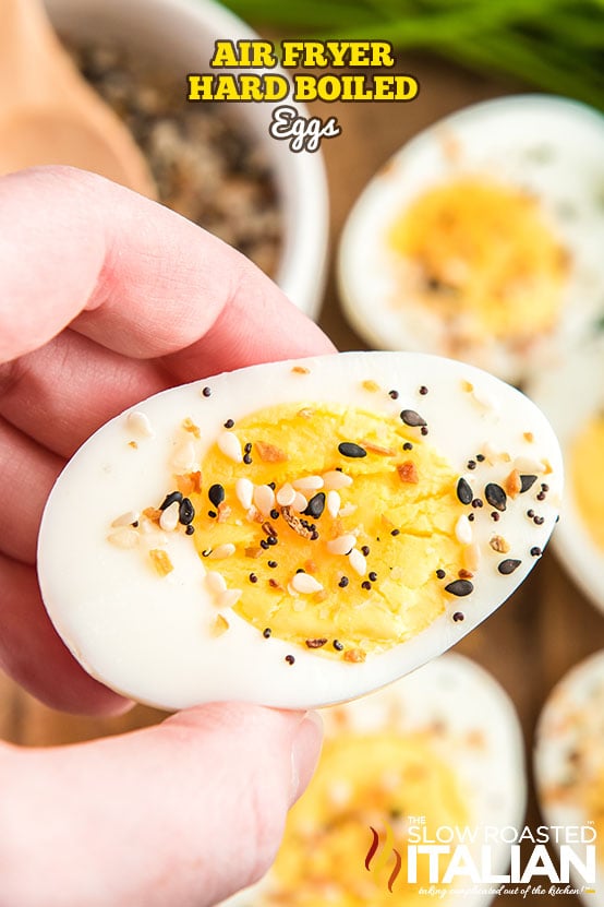 titled (shown in woman's hand) air fryer hard boiled egg