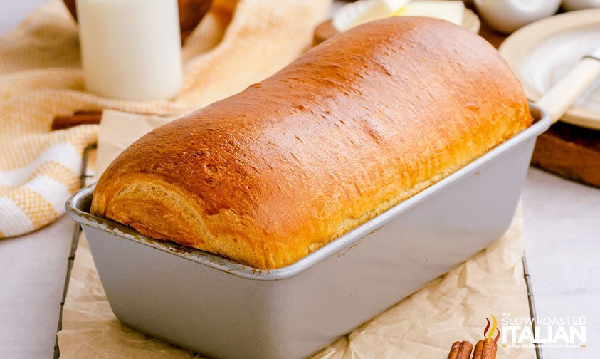 golden topped loaf of homemade bread in loaf pan