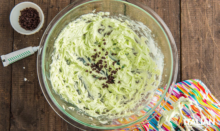 overhead: bowl with chocolate chips in green batter