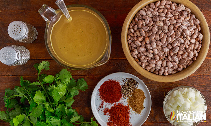 overhead: bowls of ingredients for pressure cooker pinto beans recipe