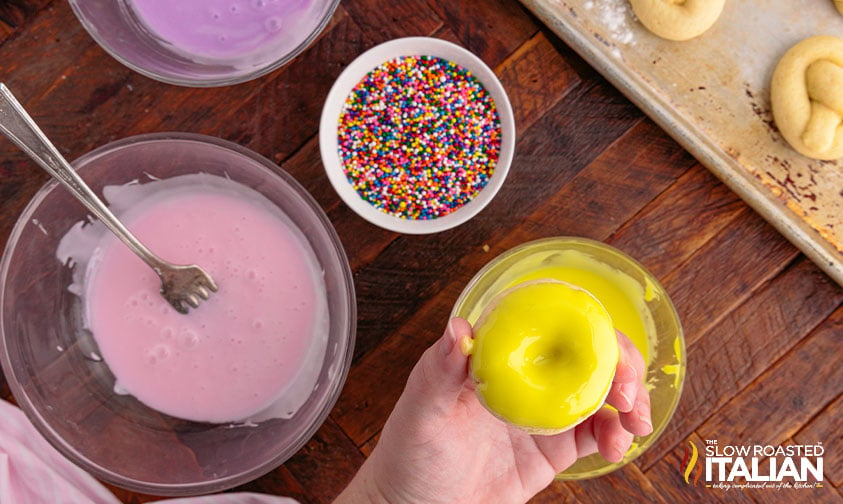 cookie decorations on counter - pink glaze and sprinkles