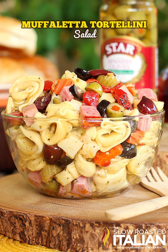 titled (shown in glass bowl) muffaletta tortellini salad