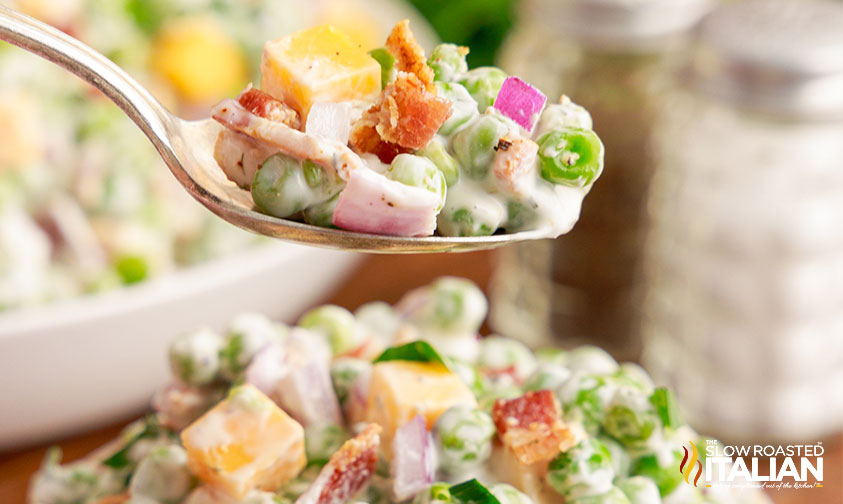 pea salad on spoon, close up