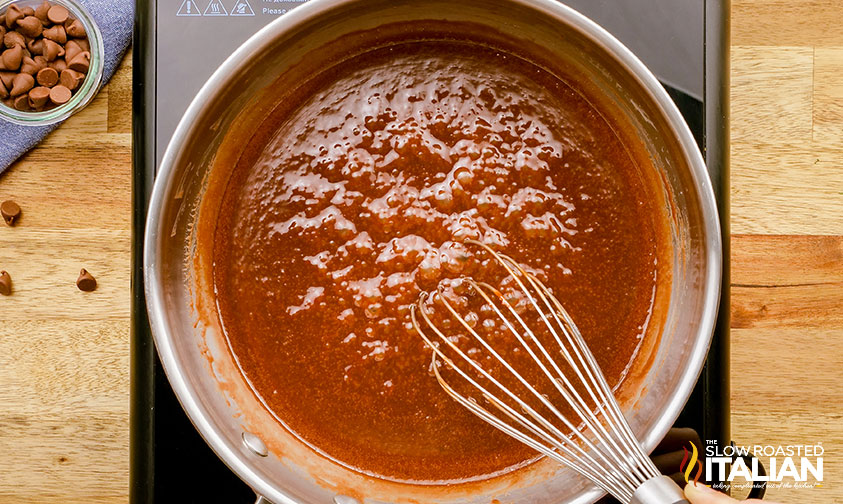 overhead: hot fudge sauce cooking in saucepan