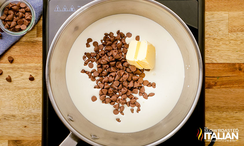 overhead: heavy cream, butter and chocolate chips in saucepan