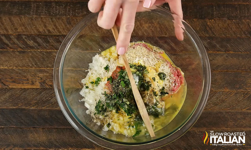 ground beef breadcrumbs egg milk and seasonings in mixing bowl